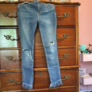 Free People Distressed Blue Jeans with Fringe Hem